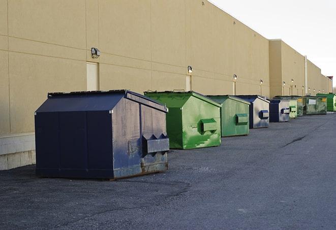 a collection of bright and vibrant dumpsters in a construction zone in Arcadia SC